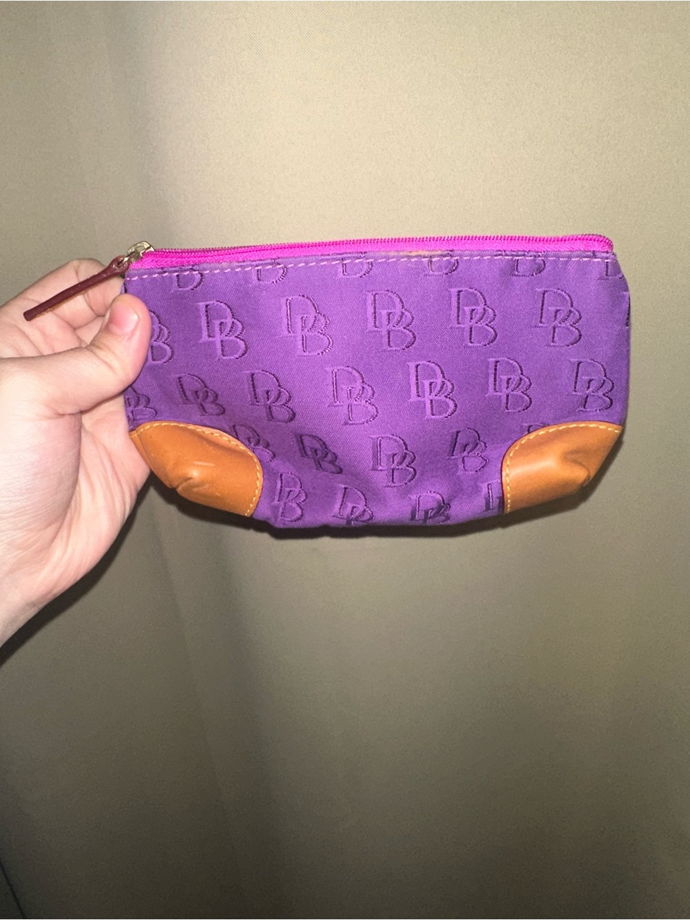 Vintage dooney and bourke purple monogram logo print with tan leather accents